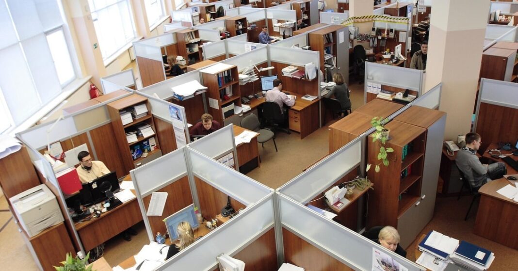 Overhead view of an office full of people with sedentary jobs